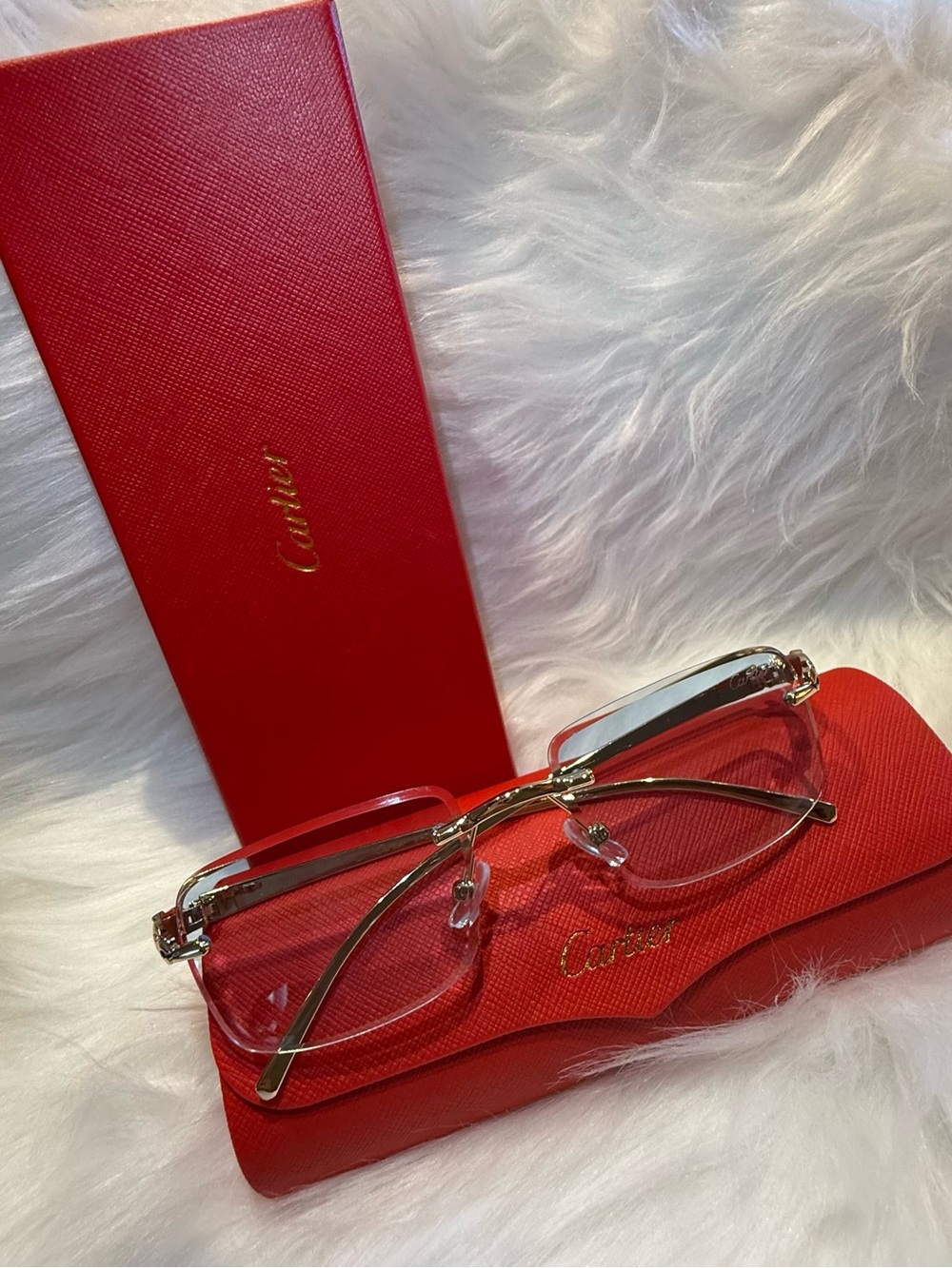 Cartier Gold Rimless Sunglasses with Red Case